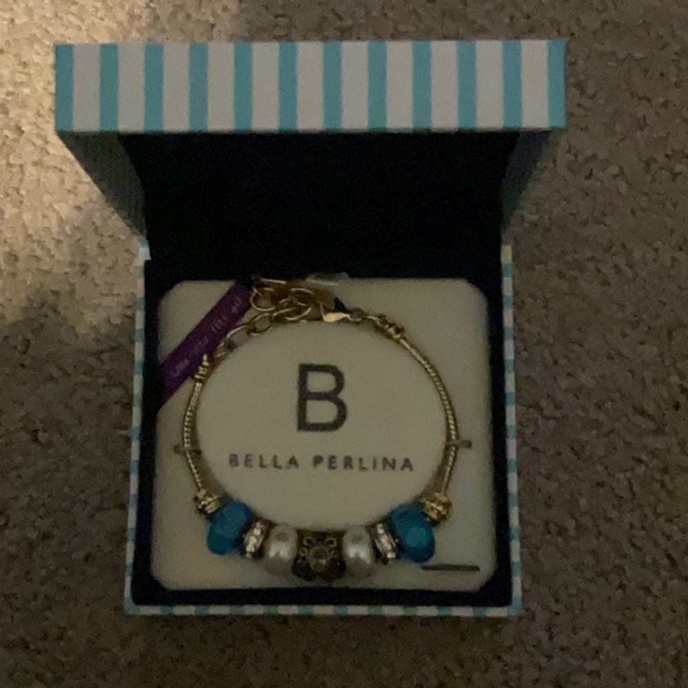 Yellow gold. Bella Perkins bracelets